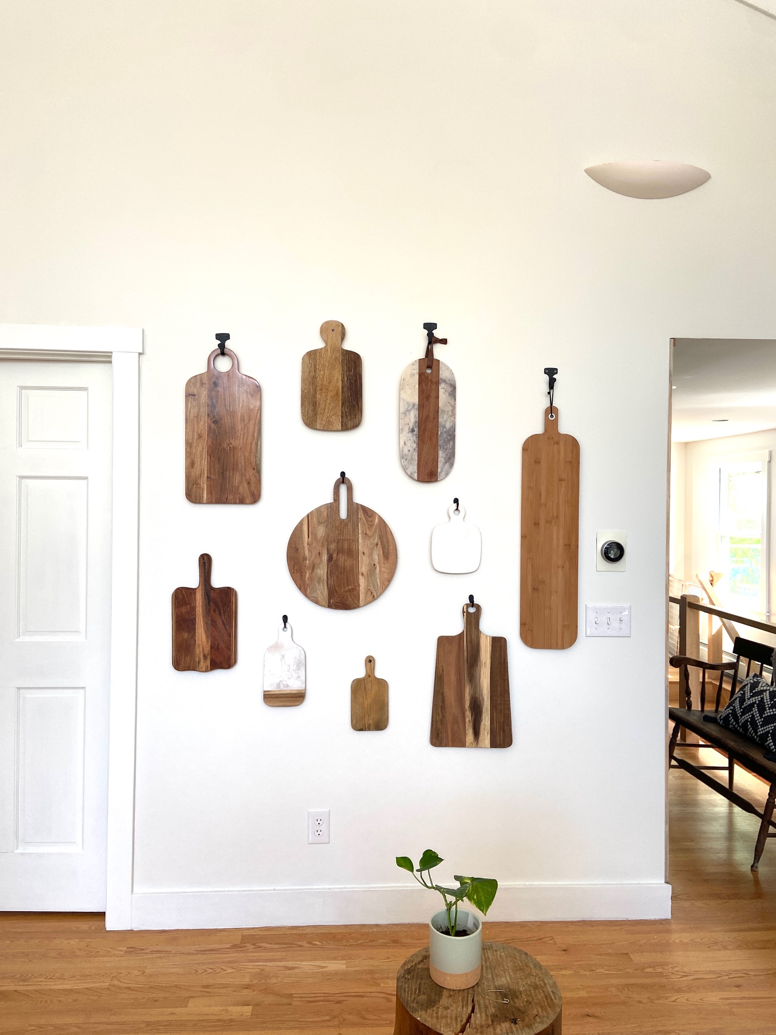 Curated cutting board gallery wall